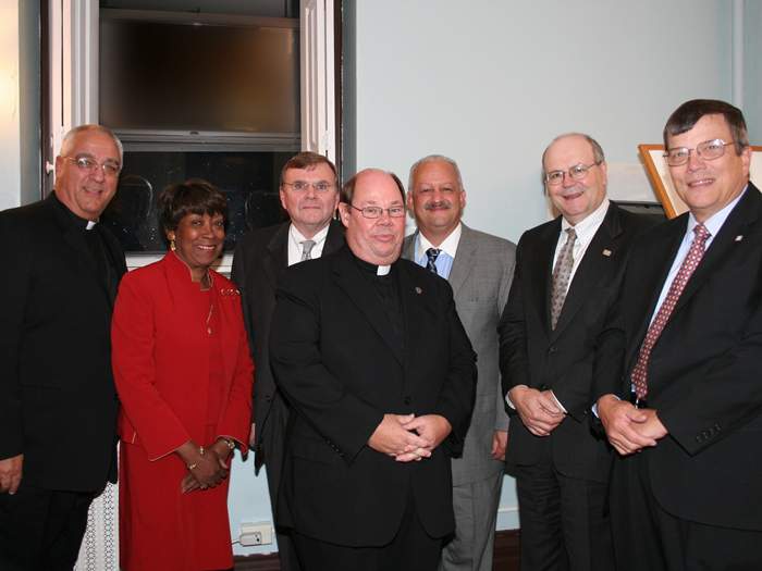 Tomás Morales and William Fritz (second and third from right) among others accepting the award