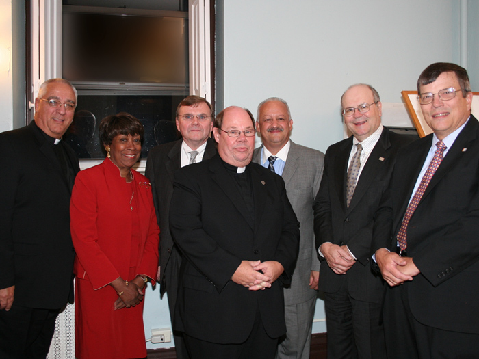 Tomás Morales and William Fritz (second and third from right) among others accepting the award 